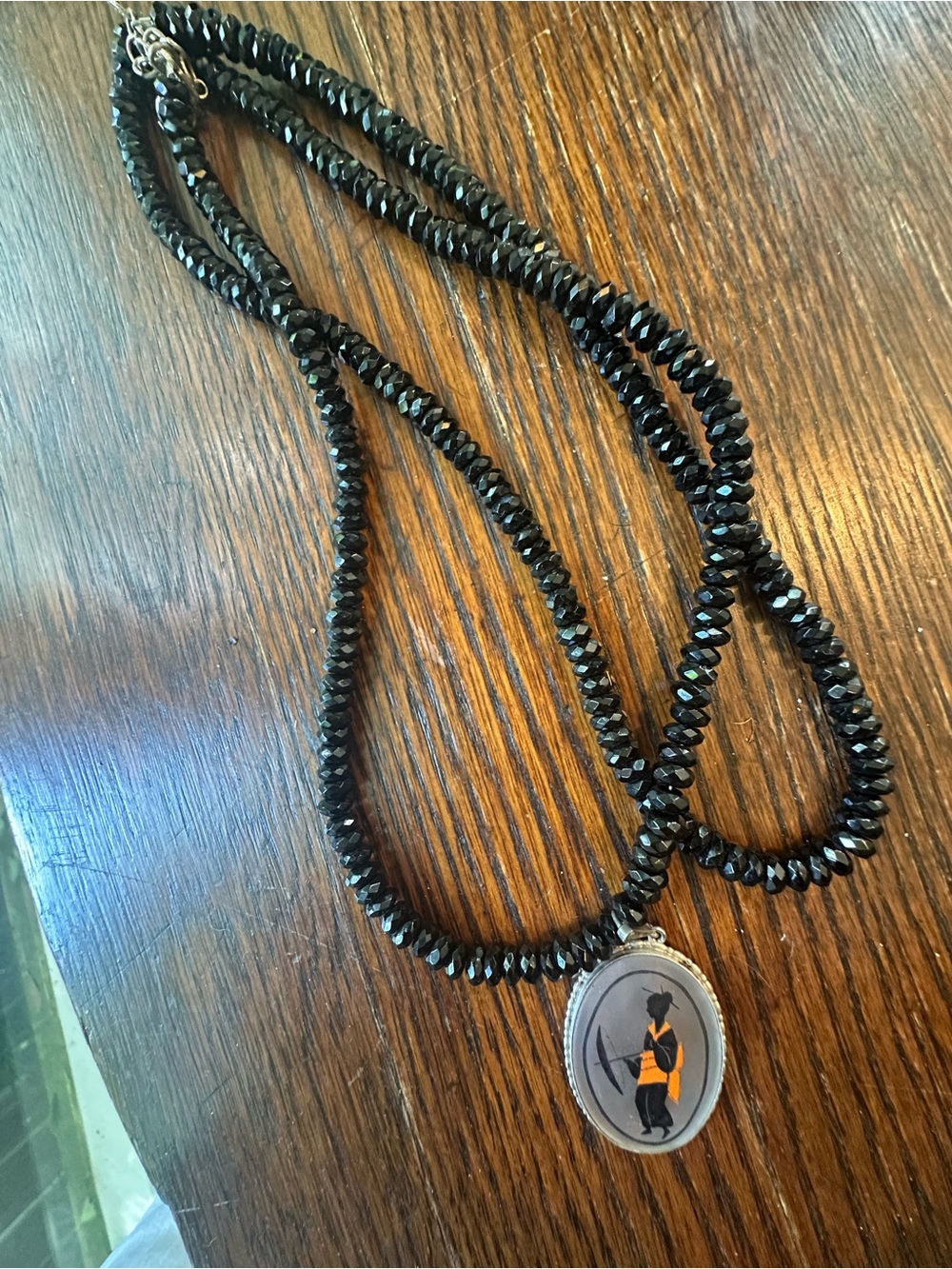 Double-Strand Black Bead Necklace with Orange Accent Pendant